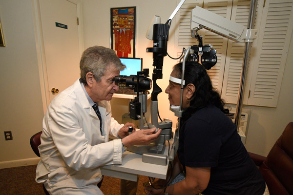Dr. Lippman Performing an Eye Exam